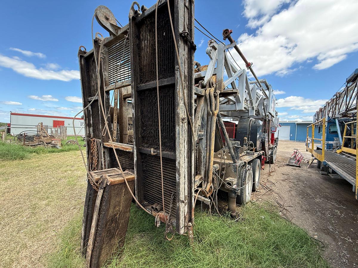 Used FRANKS EXPLORER III 96’-215K 4-AXLE WELL SERVICE WORKOVER RIG