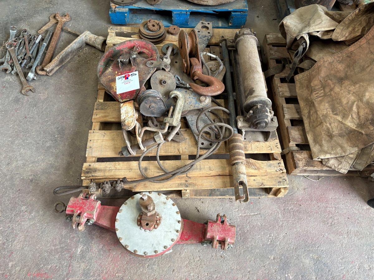 Used (4 pallets) assorted flanges, snatch blocks, we’ll head parts, flood lights, etc