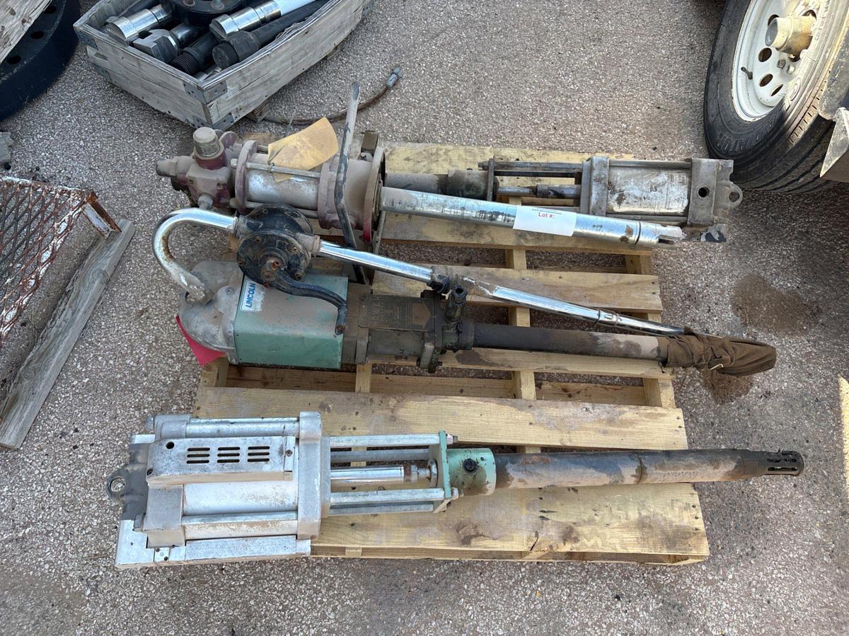 Used (4) Lincoln pneumatic grease pumps & (1) manual grease pump