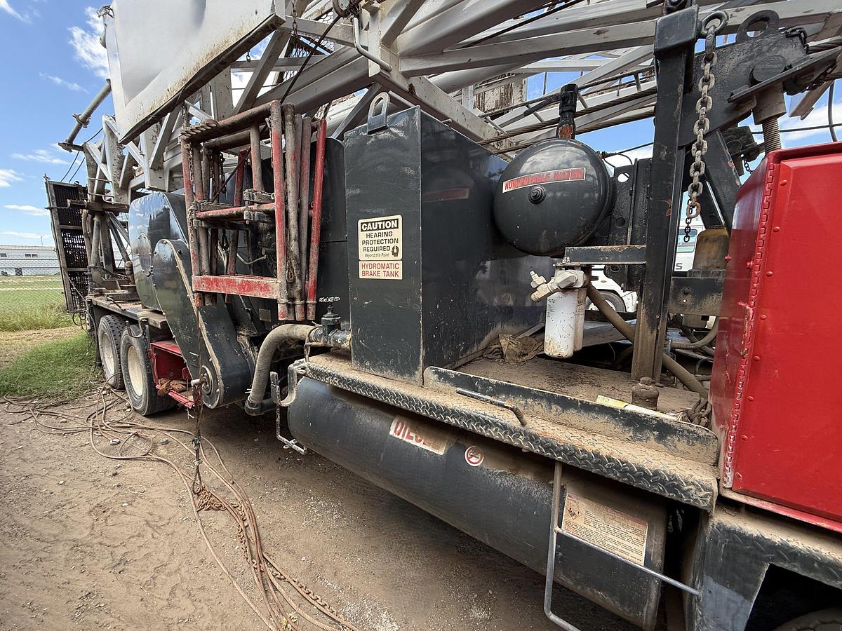 Used FRANKS EXPLORER III 96’-215K 4-AXLE WELL SERVICE WORKOVER RIG