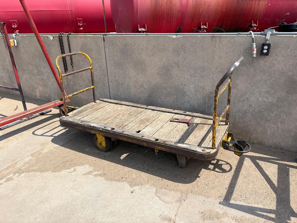 Used 5’ x 5’ x 2’ shop table, 8’ x 3’ x 4’ shelf, & 7’ x 3’ rolling cart