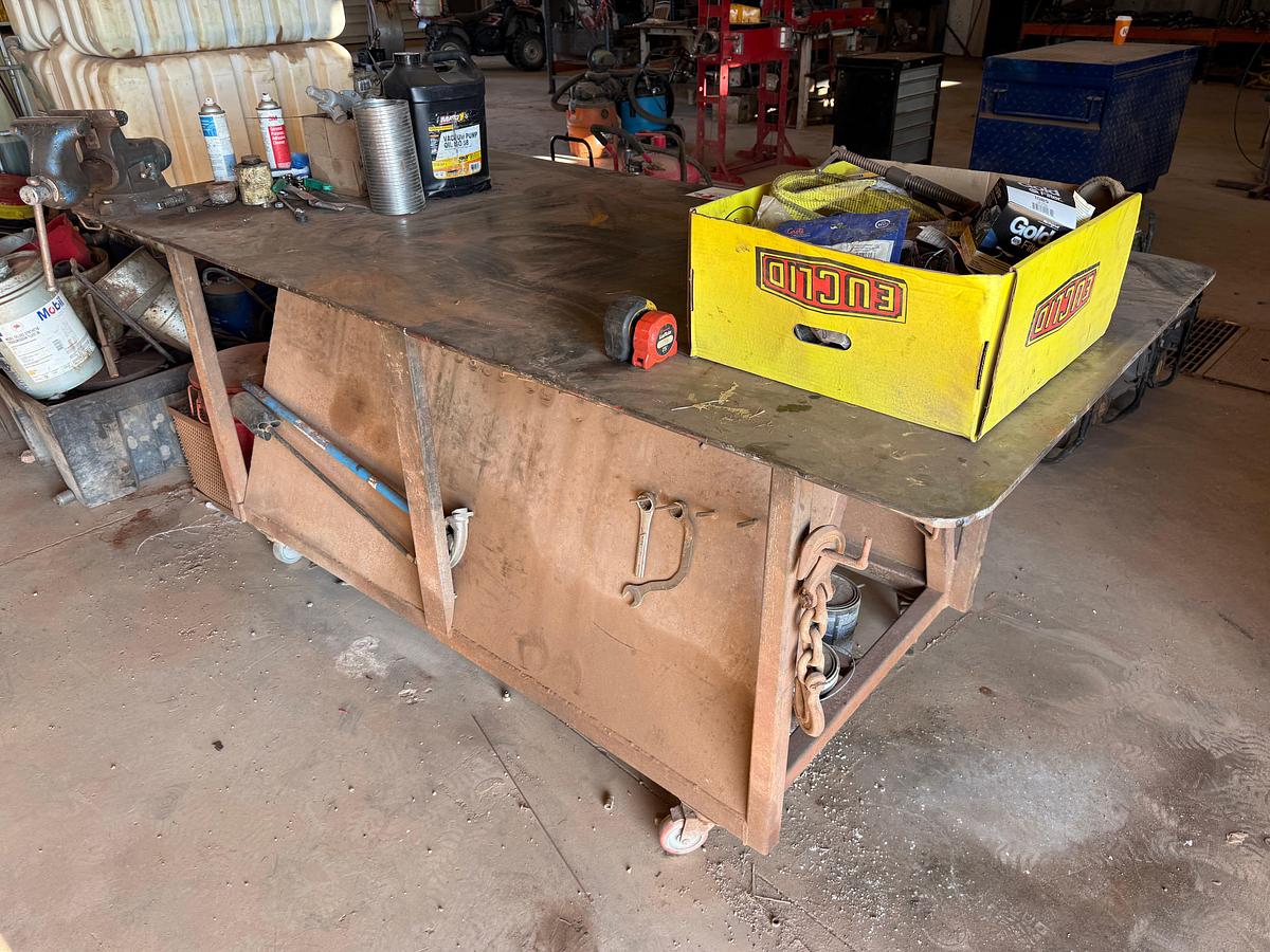 Used 8’ x 4’ x 3.4” ROLLING HD STEEL WORK TABLE W/ VICE & CONTENTS
