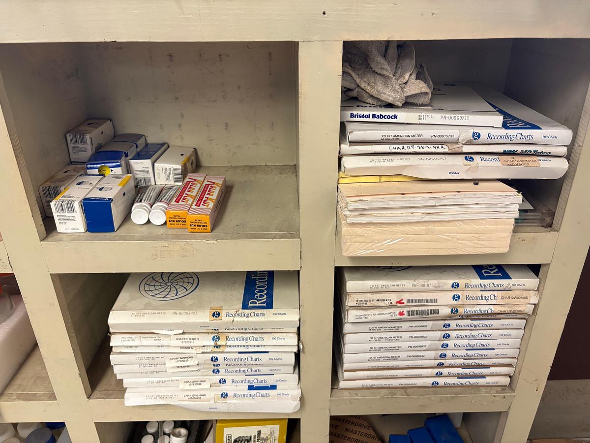 Used 18-bin shelf w/ contents