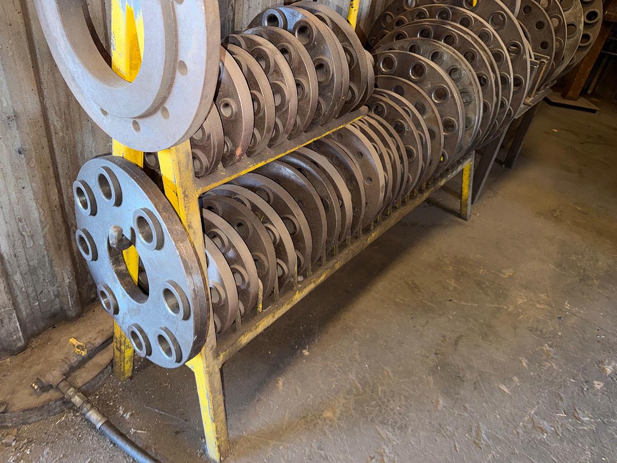 Used SECTION OF (2) WELLHEAD SPACER FLANGE RACKS W/ (25+) 6”-26” FLANGES