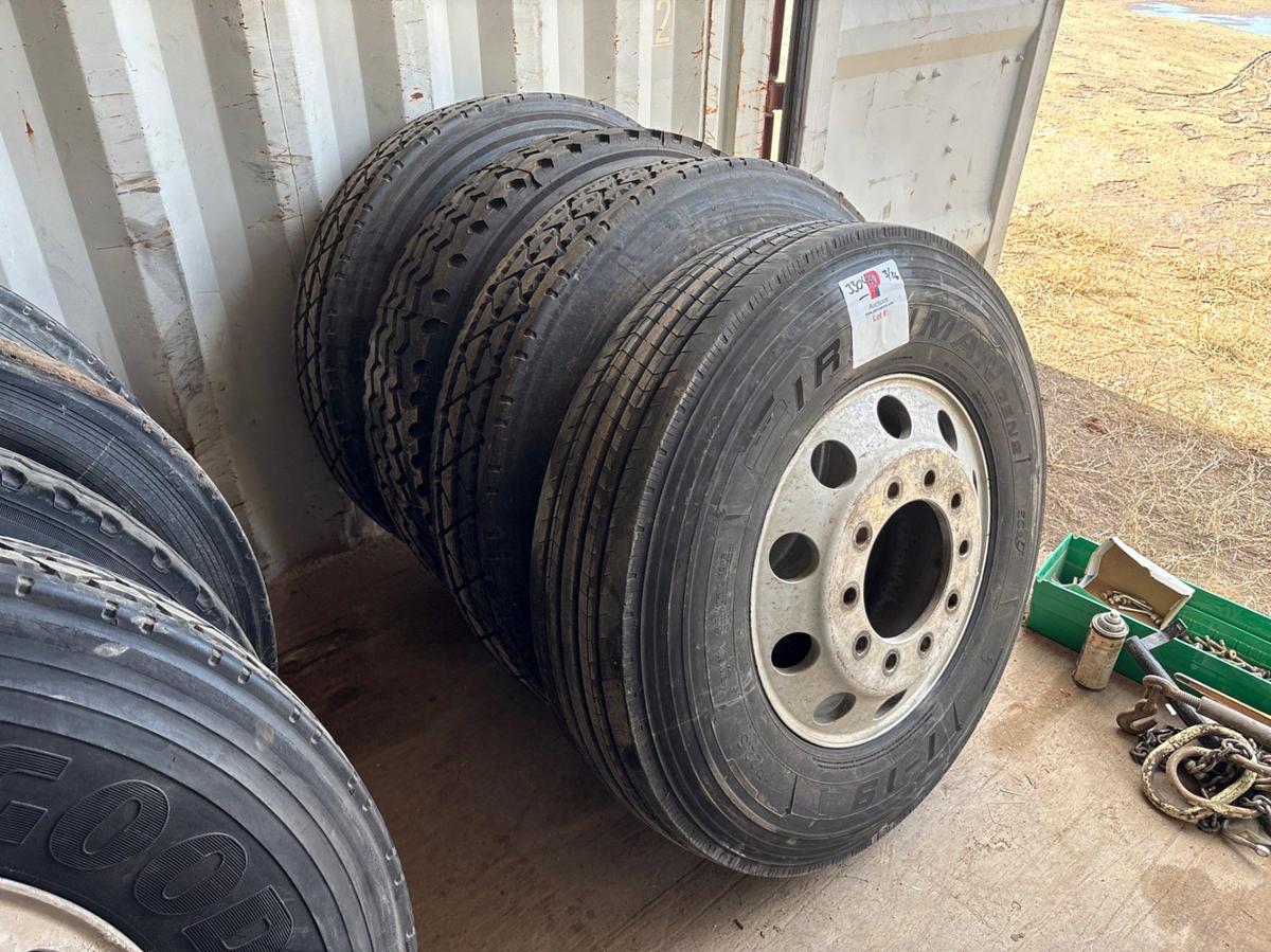Used (4) 11r22.5 tires w/ 10-lug wheels
