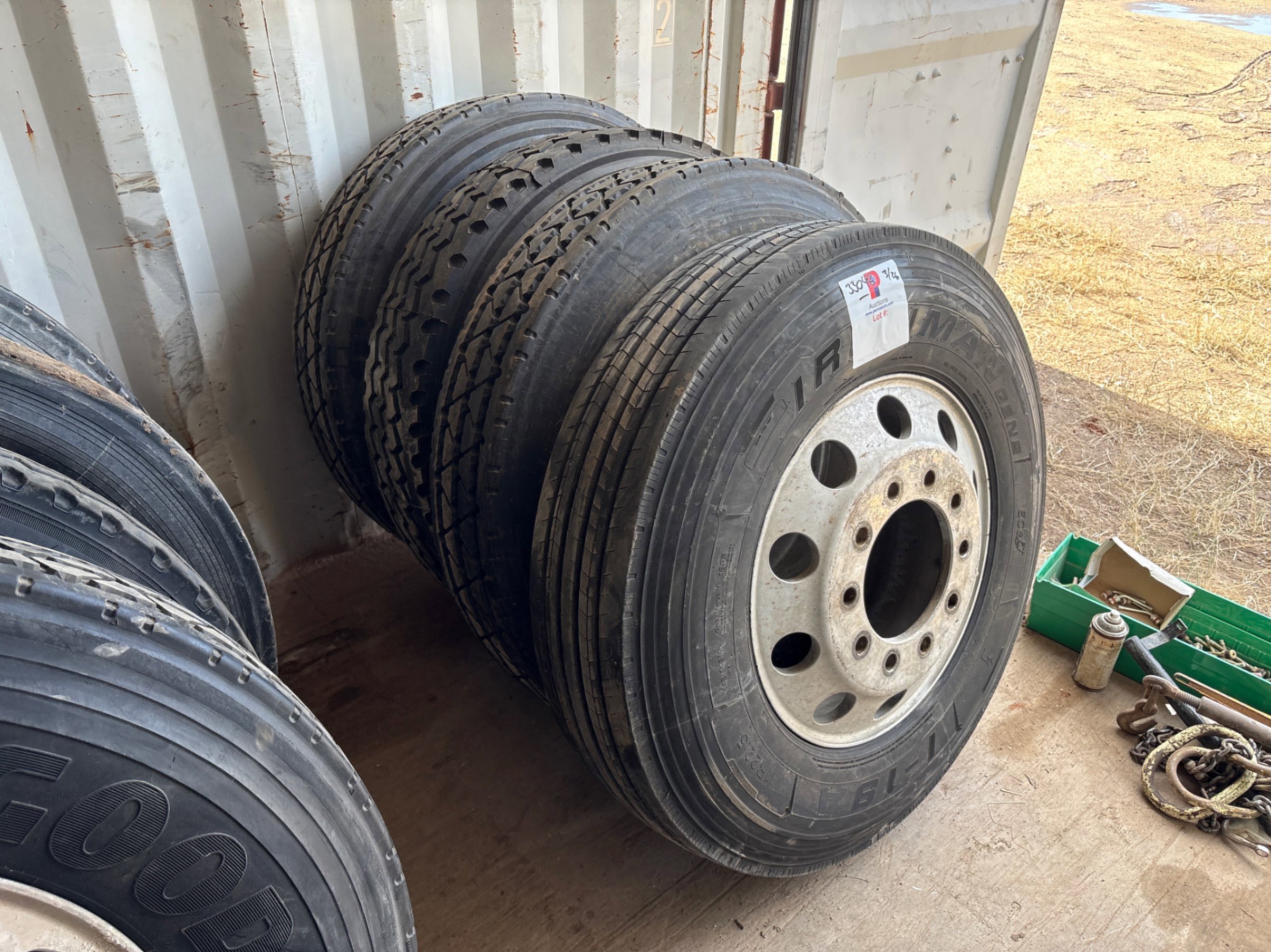 Used (4) 11r22.5 tires w/ 10-lug wheels