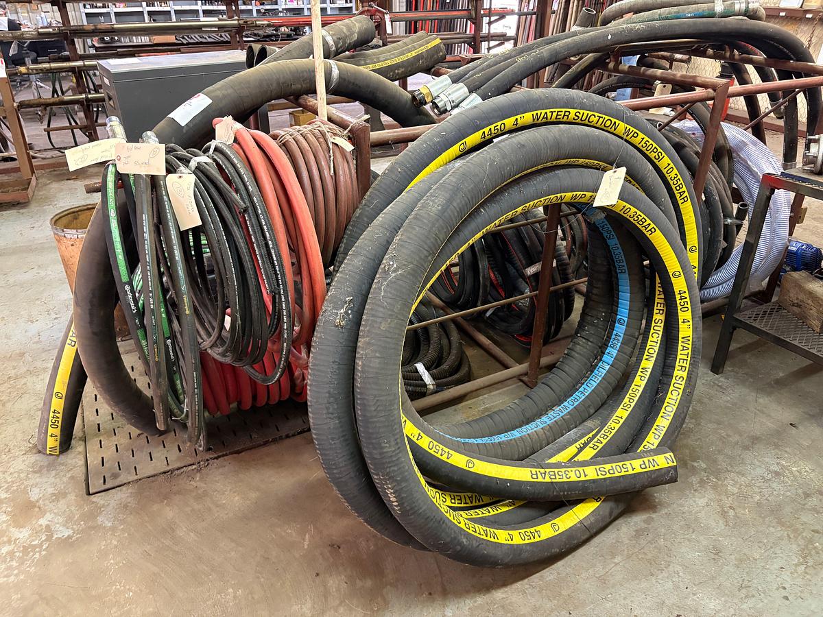 Used 8’ x 4’ x 4’ rack w/ assorted vacuum, hydraulic, & rubber hoses