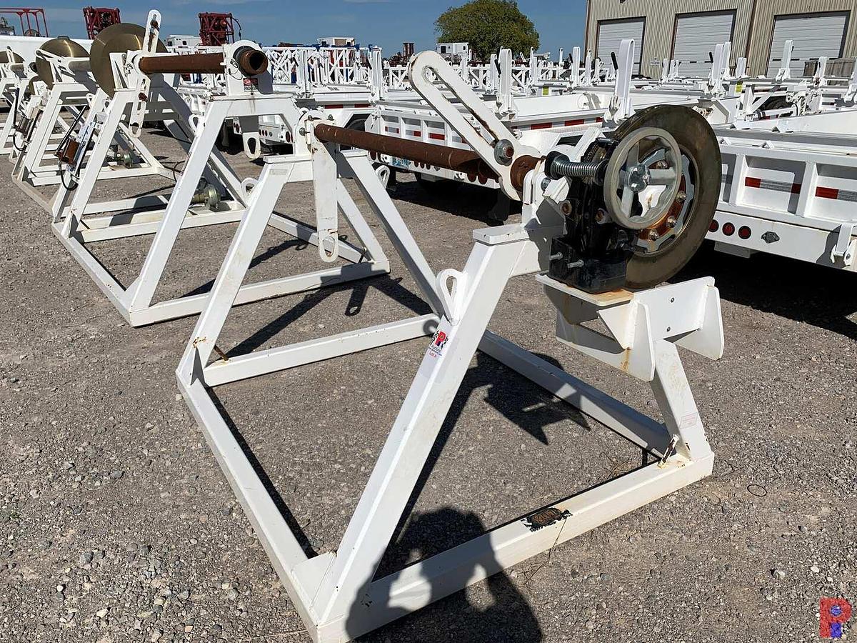 Used 66”W X 48”H REEL STAND W/ ADJUSTABLE 16” BRAKE CALIPER