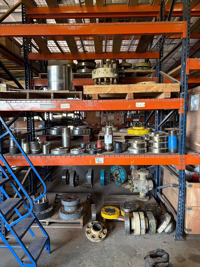 Used Contents of (3 shelves) w/ assorted stainless steel landing flanges, 4-1/16” 5k SS cross, DSAs, pipe nipples, collars, etc