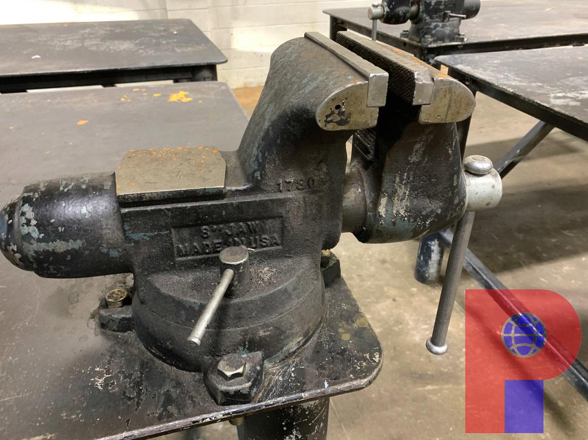 Used 8’ X 4’ STEEL TABLE W/ VICE