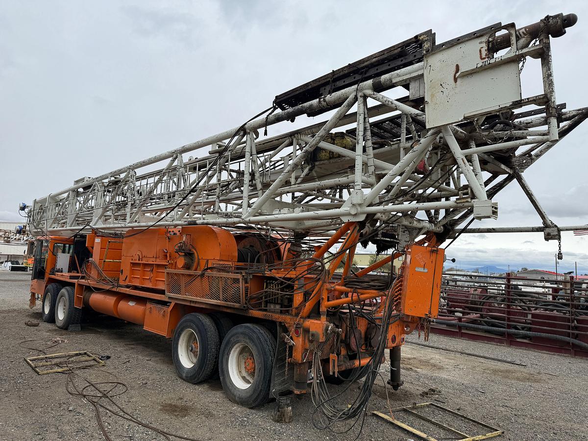 Used 1984 FRANKS MOBILRIG 300 1287/160 DTD-HT 96’-215K 4-AXLE WELL SERVICE WORKOVER RIG