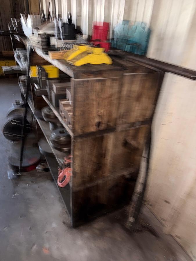 Used WALL W/ 3-ROW WOOD SHELF & CONTENTS OF MILLING MACHINE FIXTURES, ADAPTERS, & RELATED