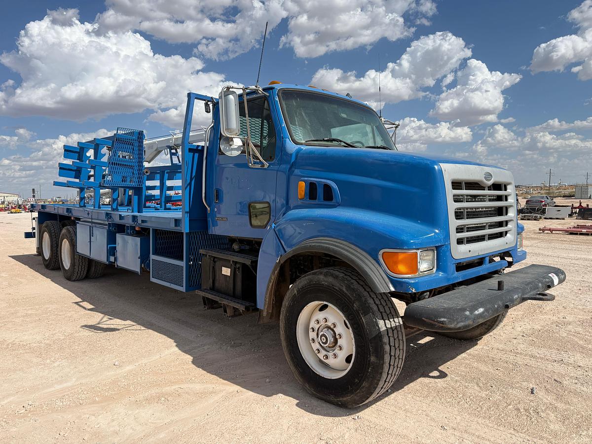 Used 2002 STERLING LT9500 T/A 24’ FLATBED FLOW IRON CRANE TRUCK