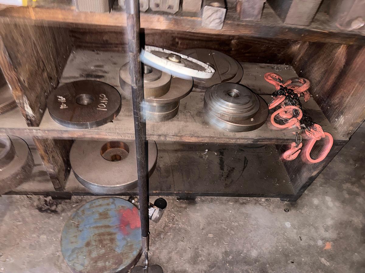 Used WALL W/ 3-ROW WOOD SHELF & CONTENTS OF MILLING MACHINE FIXTURES, ADAPTERS, & RELATED