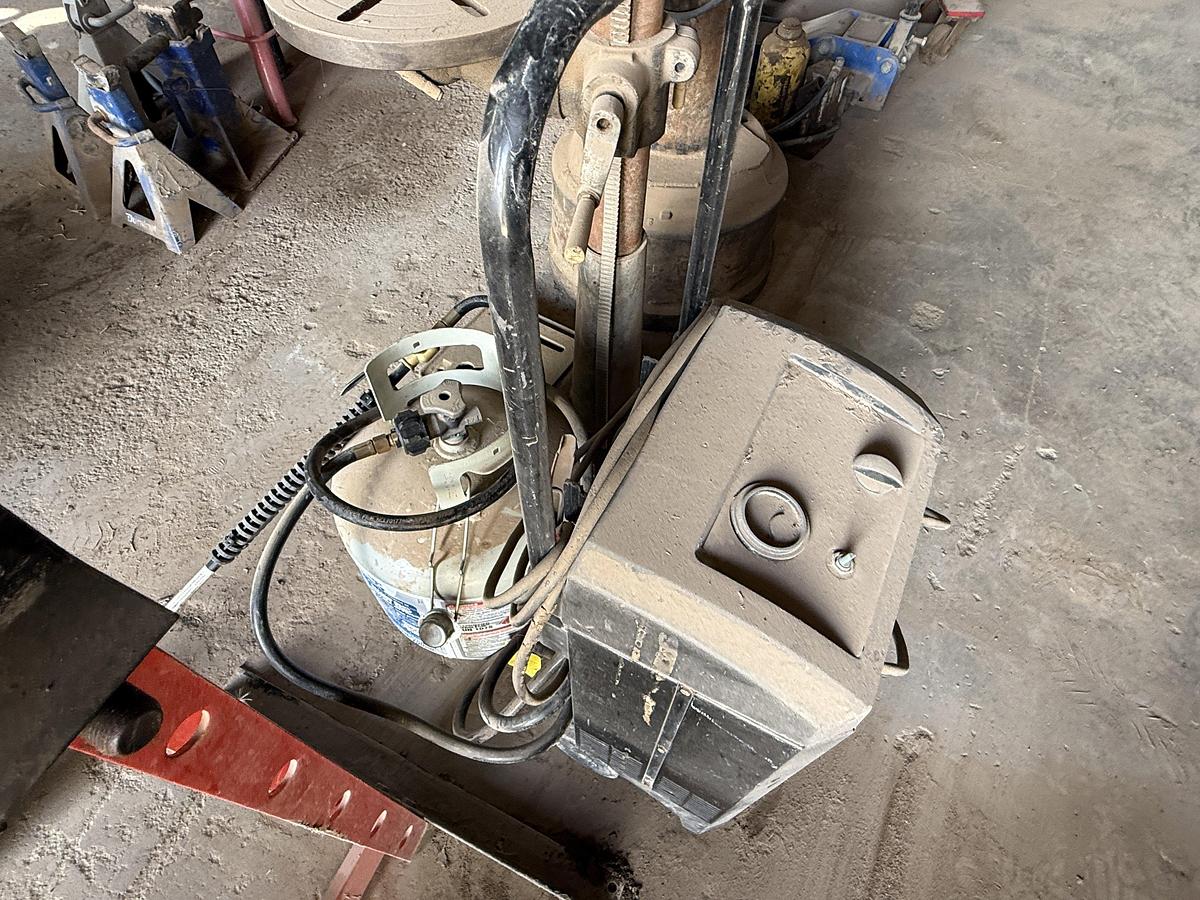 Used (1) WILTON VICE MTD ON STAND, (1) ELECT. 13” DRILL & (1) 20 TON BOTTLE JACK PRESS, (1) PROPANE BOTTLE & TORCH, BATTERY CHARGER