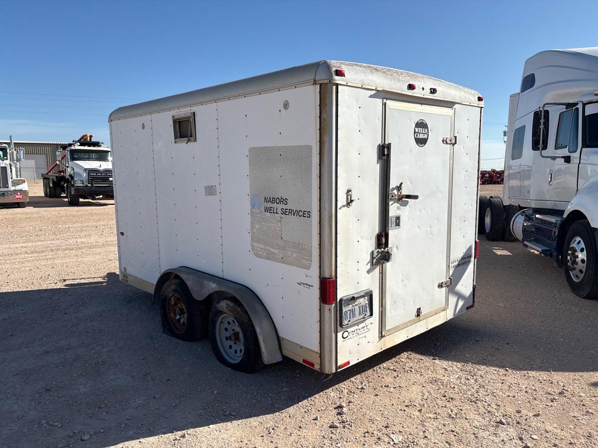 Used Wells Cargo 12’ X 7’ t/a bumper pull doghouse trailer