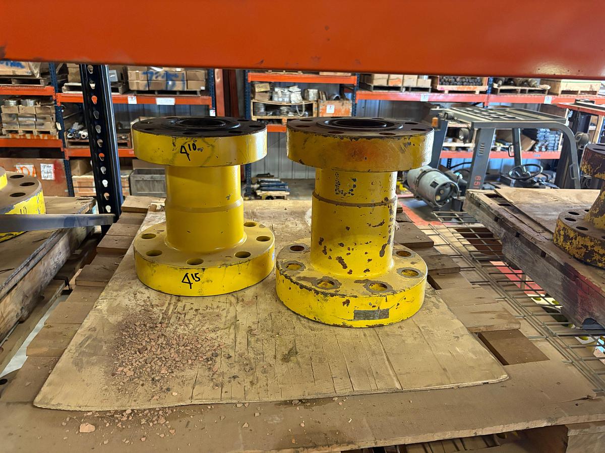 Used (4 shelves) w/ assorted 4” to 7” spools, single stud adapters, & 5” 10k blind flanges