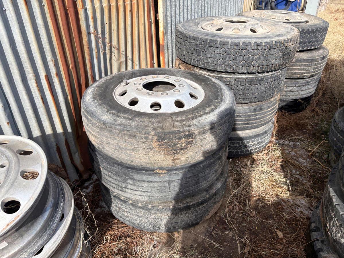 Used (11) 11r22.5 tires w/ (15) 10-lug aluminum wheels