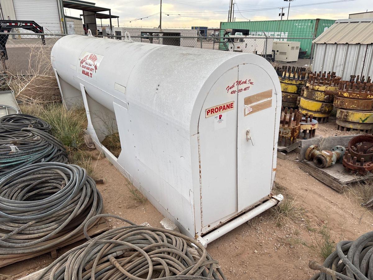 Used 18’ x 3.5’ x 70” 1,000 gallon propane tank, skidded