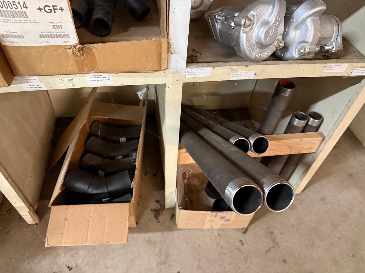 Used SECTION OF MOSTLY HEAVY WALL PVC & STEEL FITTINGS, VICTAULIC COUPLERS, SWAGES, COLLARS, NIPPLES, (3) 2” JAYCO VENT VALVES