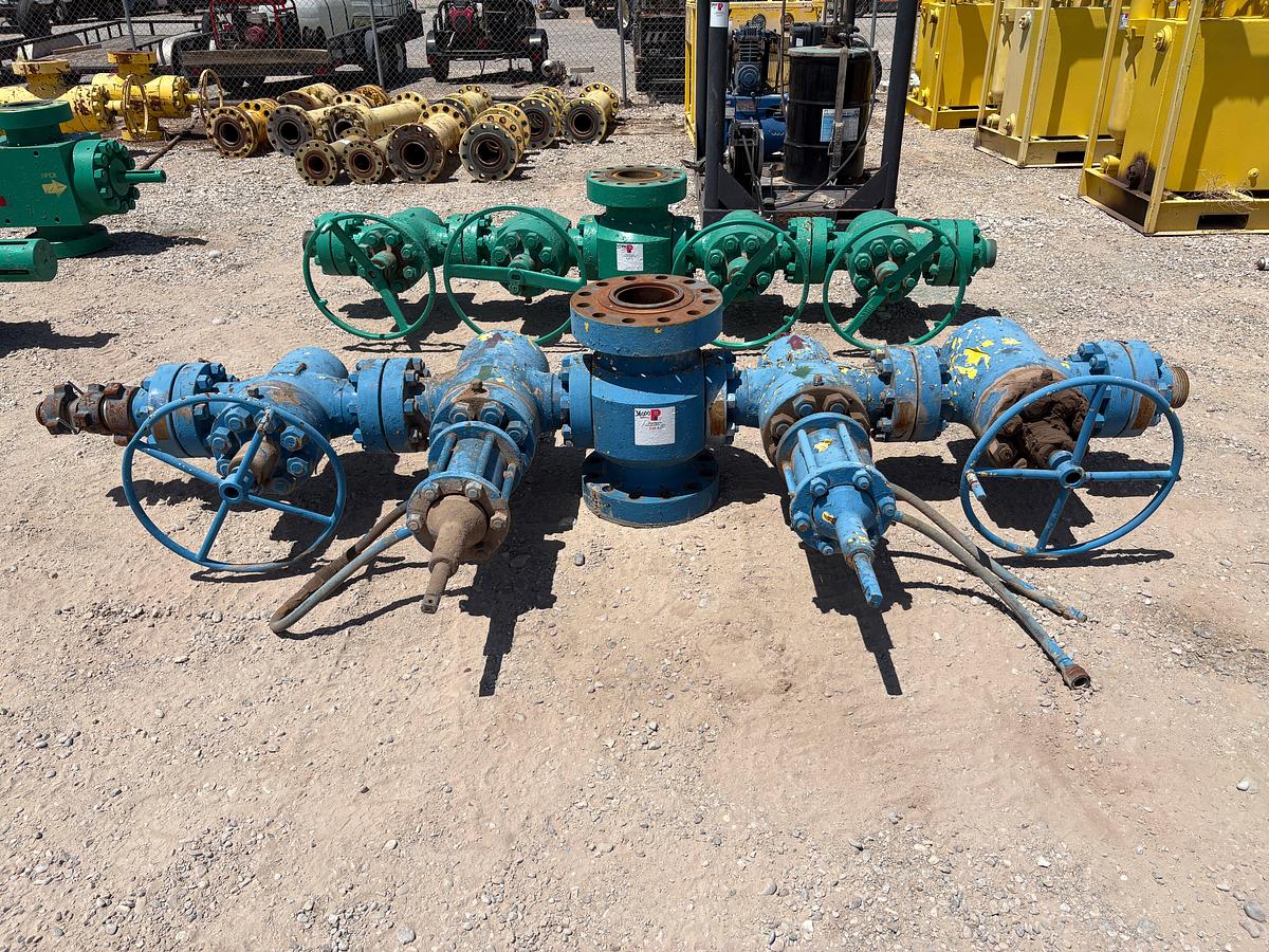 Used 7-1/16” x 4” fluid cross w/ (4) 4” 10k gate valves