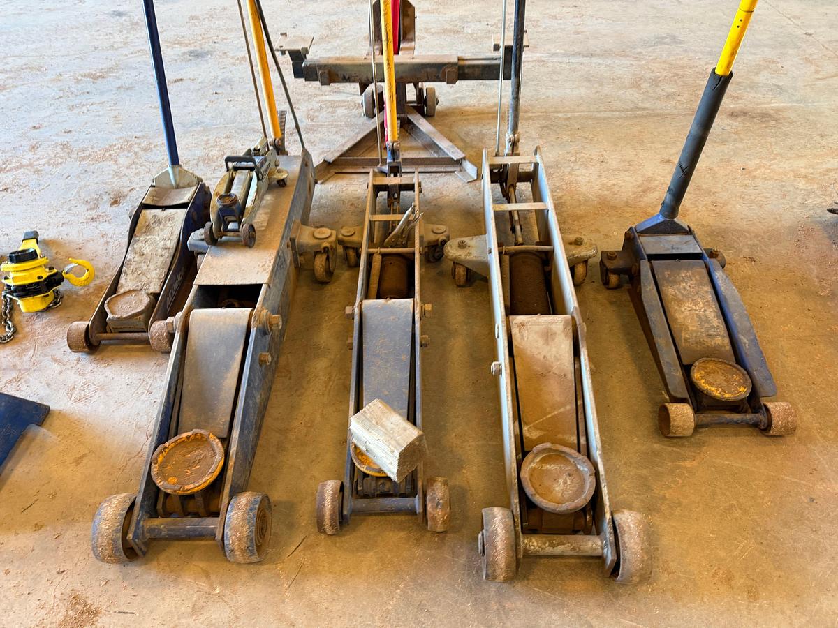 Used LOT OF (7) 2-TON TO 20-TON FLOOR JACKS, (1) 1-1/2 TON CHAIN HOIST, (2) DAYTONA WHEEL DOLLEYS, (6) 10-TON TO 22-TON JACK STANDS