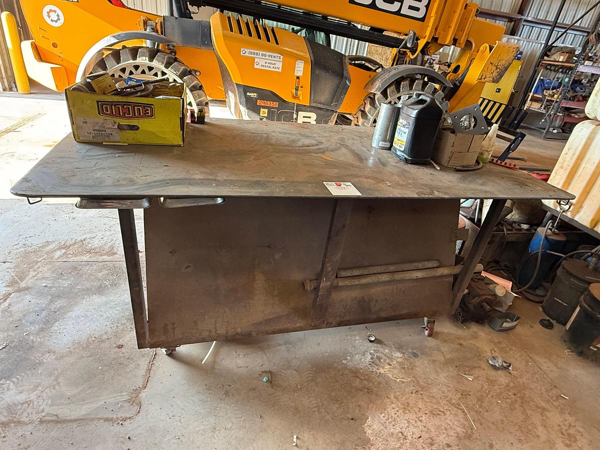 Used 8’ x 4’ x 3.4” ROLLING HD STEEL WORK TABLE W/ VICE & CONTENTS