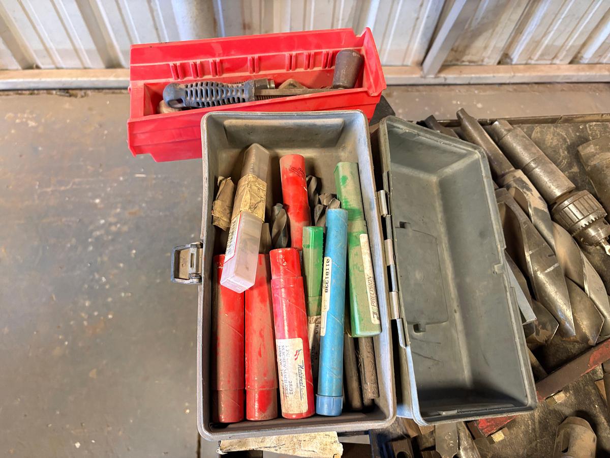 Used 37” x 26” x 34” table w/ assorted drill press chucks, drill bits, tap & dies, & assorted bolts