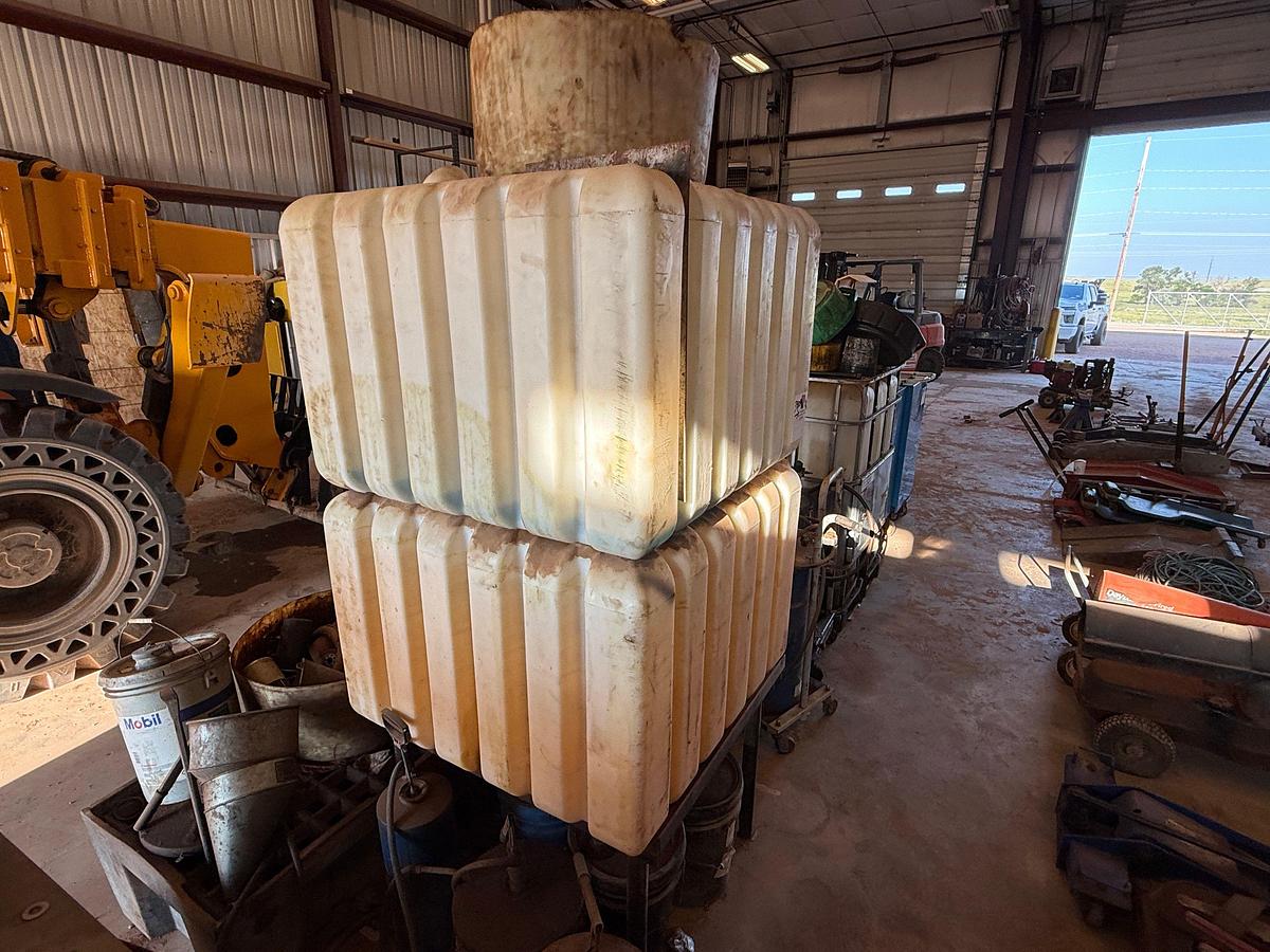 Used LOT W/ (2) 150-GALLON STEEL ROLLING OIL TANKS W/ AIR PUMPS, GUNS, & HOSES, (HAS SOME FLUID), (3) ROLLING LUBE BBLS, & RELATED