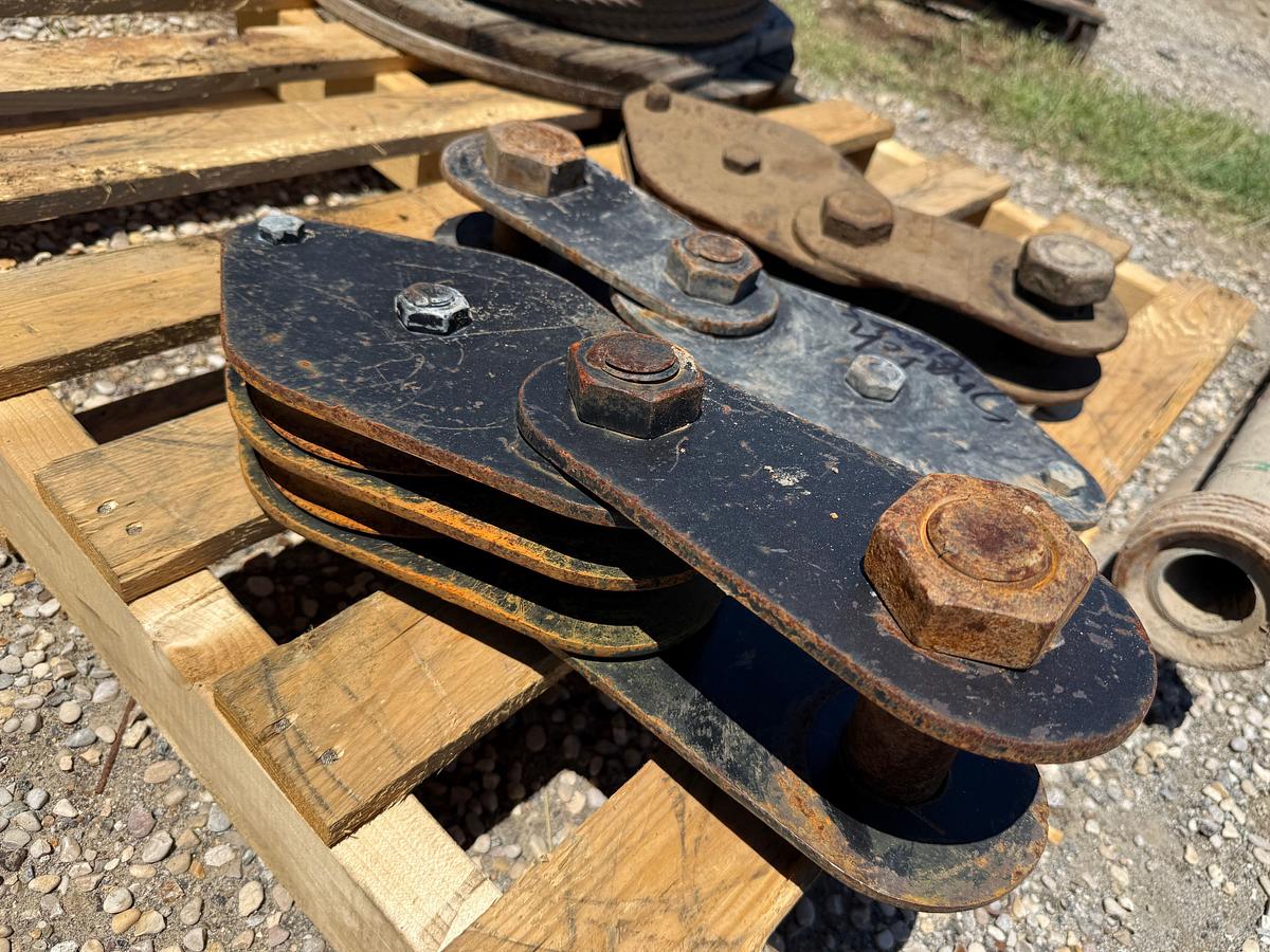 Used PALLET W/ (3) SNATCH BLOCKS & (1) SPOOL OF 1/2” WIRE ROPE
