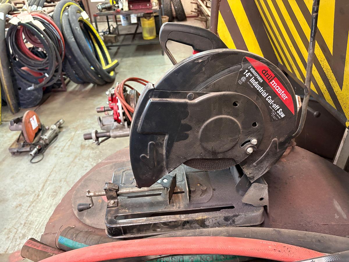 Used 4’Dia x 3’ metal shop table w/ drill master 14” industrial cut off saw