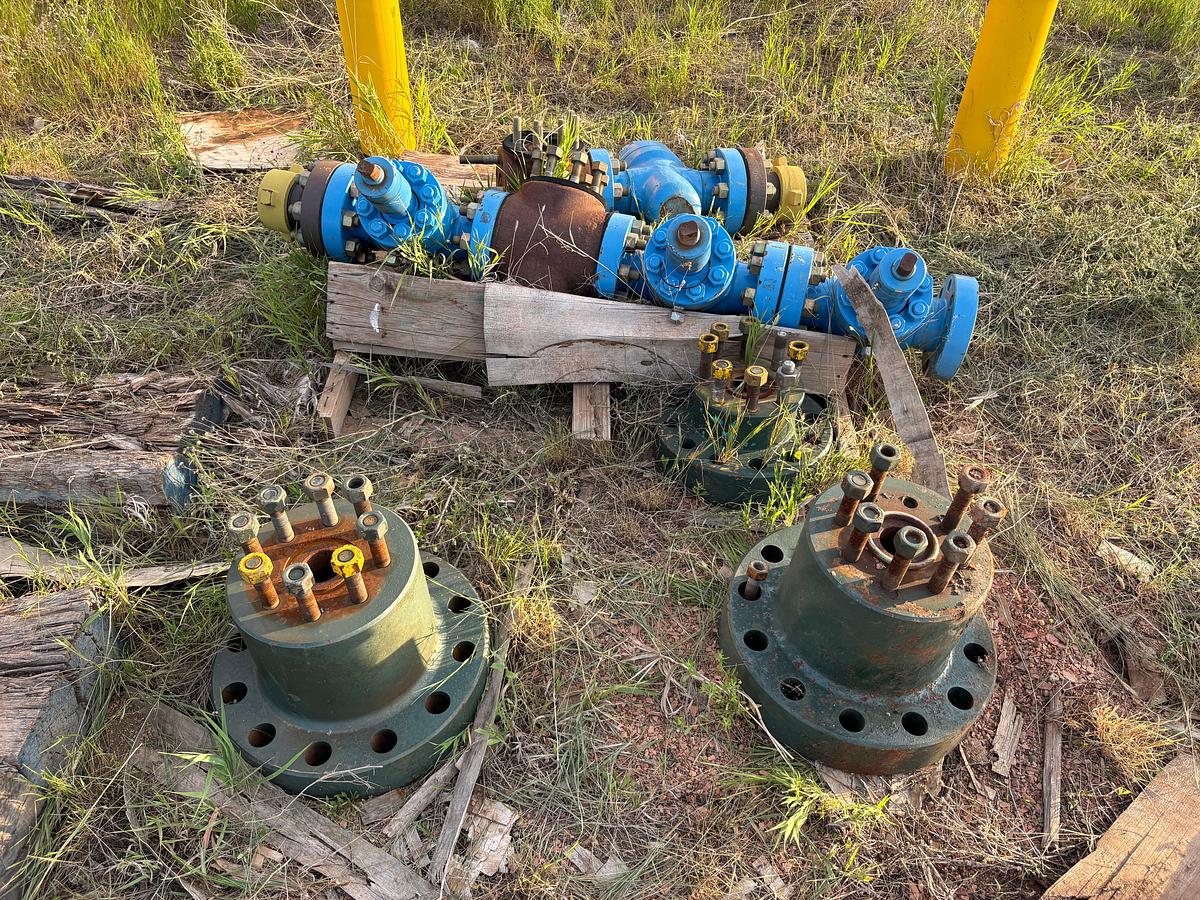 Used (2) 4-1/16” 10k hydraulic gate valves, (10) 2-9/16” gate valves, & (3) single stud adapters