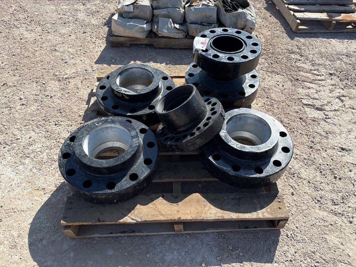 Used (1) 7-1/16” x 13” spacer spool & (4) assorted companion flanges