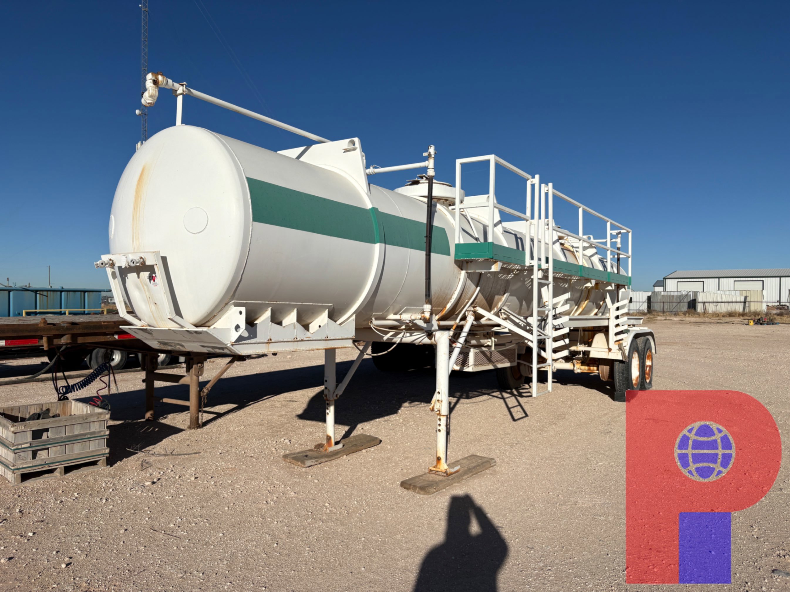 Used 130BBL 2-COMPARTMENT T/A FLUID HAUL TRAILER