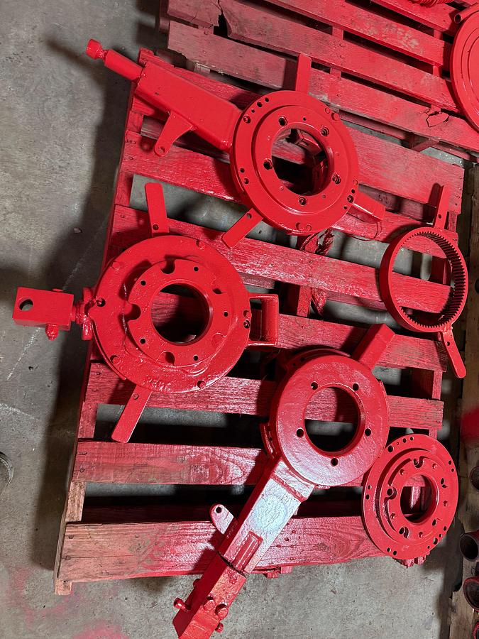 Used (2) PALLETS W/ TONG BACKUPS, HANGING BRACKET, & TOP PLATES