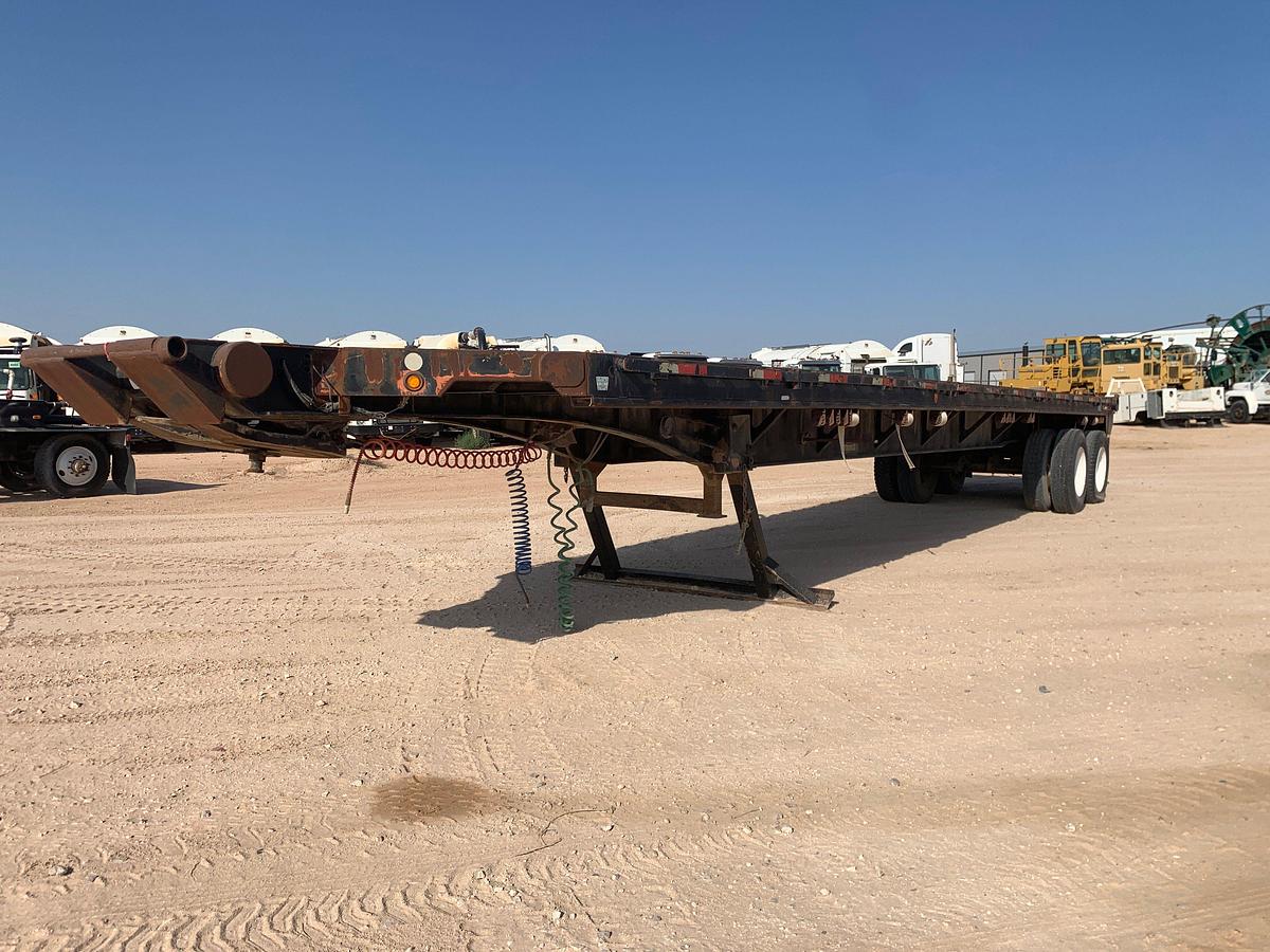 Used Dynaweld 46’ x 102” t/a flatbed trailer