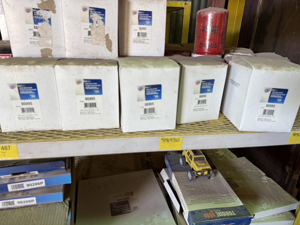 Used (2) 120”L X 24”W X 72”H 5-TIER METAL RACKS W/ TRUCK & ENGINE PARTS CONTENTS