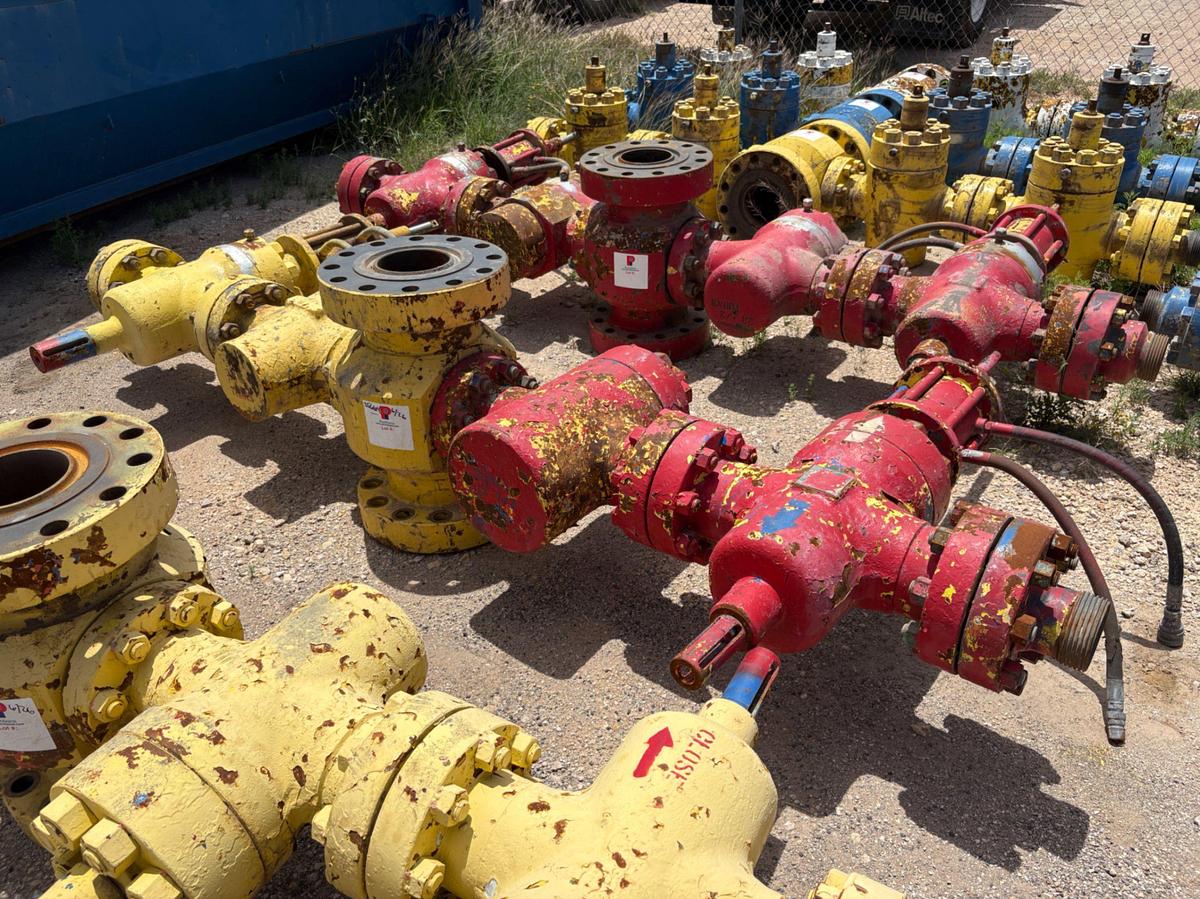 Used 7-1/16” x 4” fluid cross w/ (4) 4” 10k gate valves