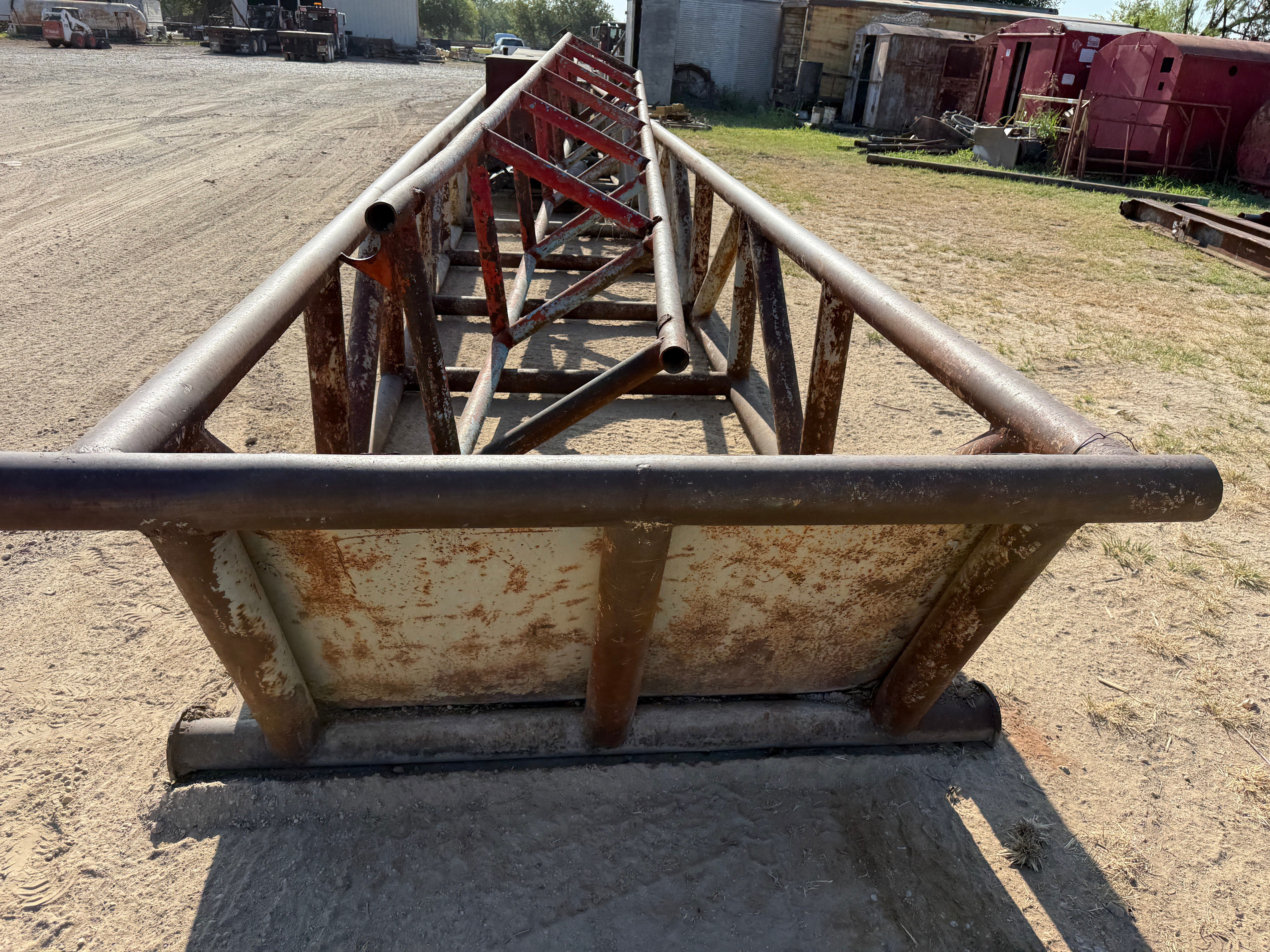 Used 50’ x 5’ x 3’ SKIDDED PIPE TUB W/ CONTENTS