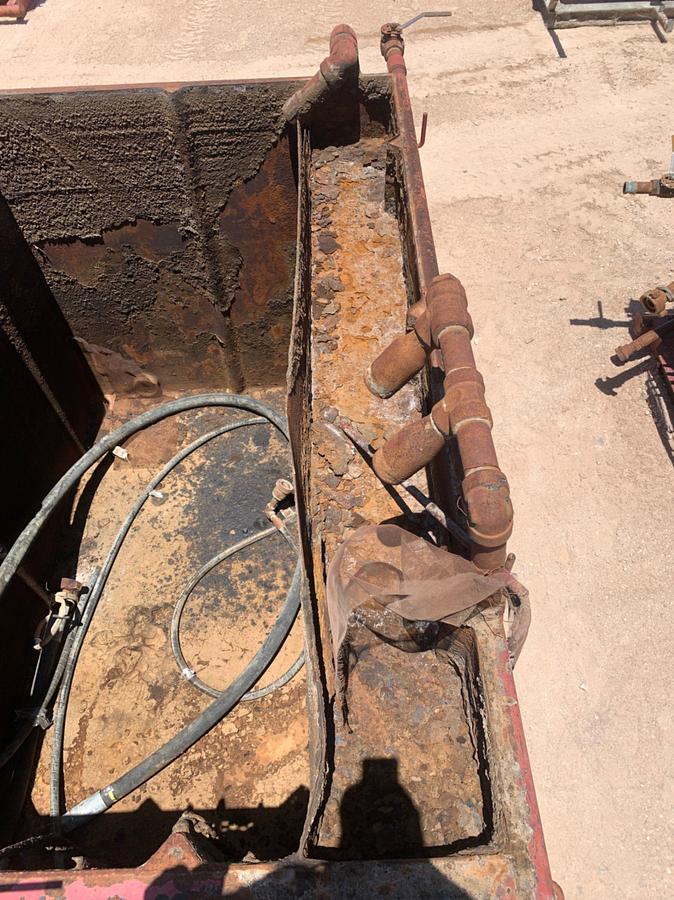 Used 21’ L x 9’ W x 8’ T 115 Bbl Open Top Skidded Tank