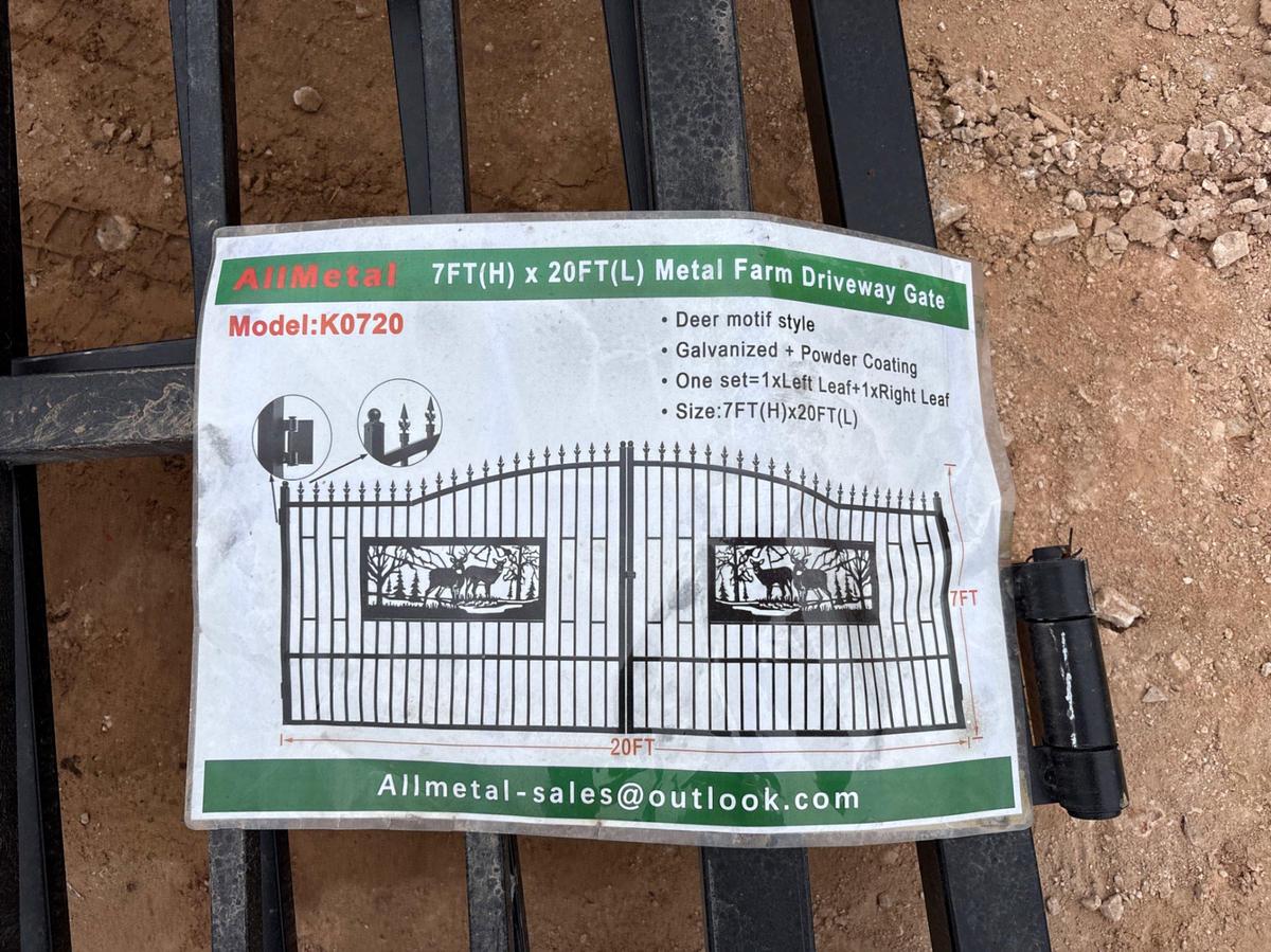 Used Allmetal 20’L X 7’H dual swing gate w/ deer design