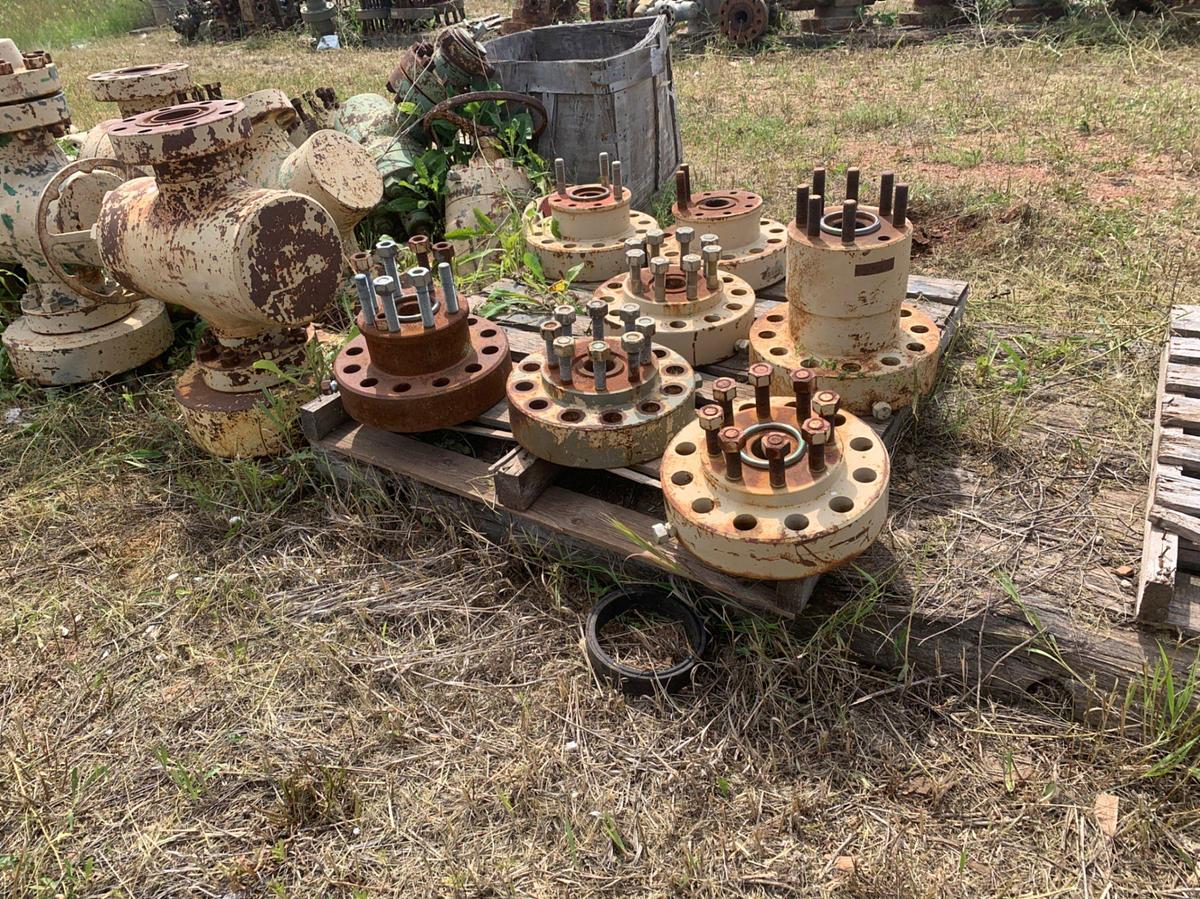 Used Row of 2in Flange Adapters, Caps, DSA’s, 4-1/16 Plug Valves, 7-1/16 Casing Heads and 2in Fluid Crosses