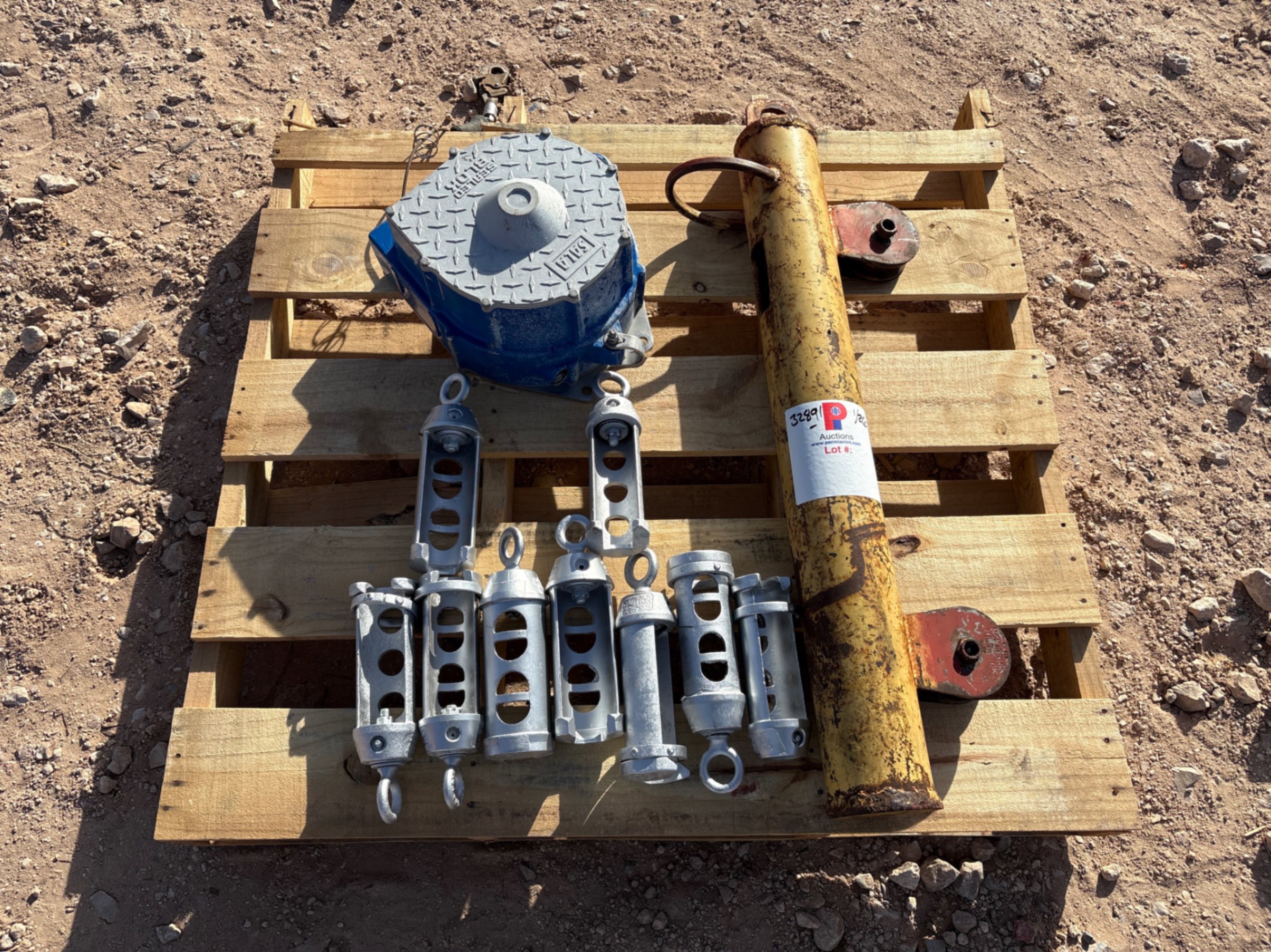 Used Pallet w/ (9) rod transfers, (1) MCKISSICK climbing weight, & (1) sala fall safety device