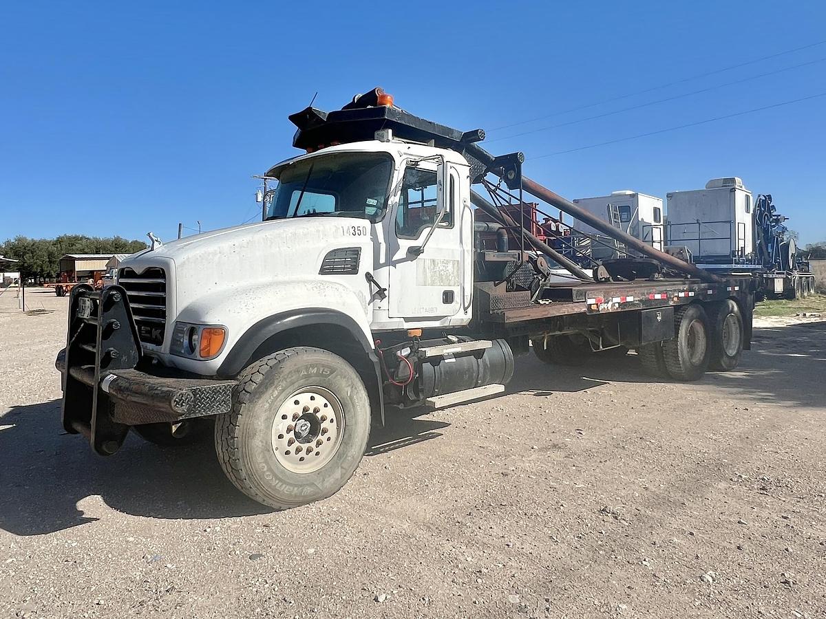 Used 2007 MACK CV713 T/A 65K GIN POLE WINCH TRUCK