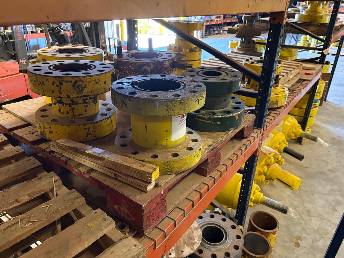 Used (4 shelves) w/ assorted 4” to 7” spools, single stud adapters, & 5” 10k blind flanges