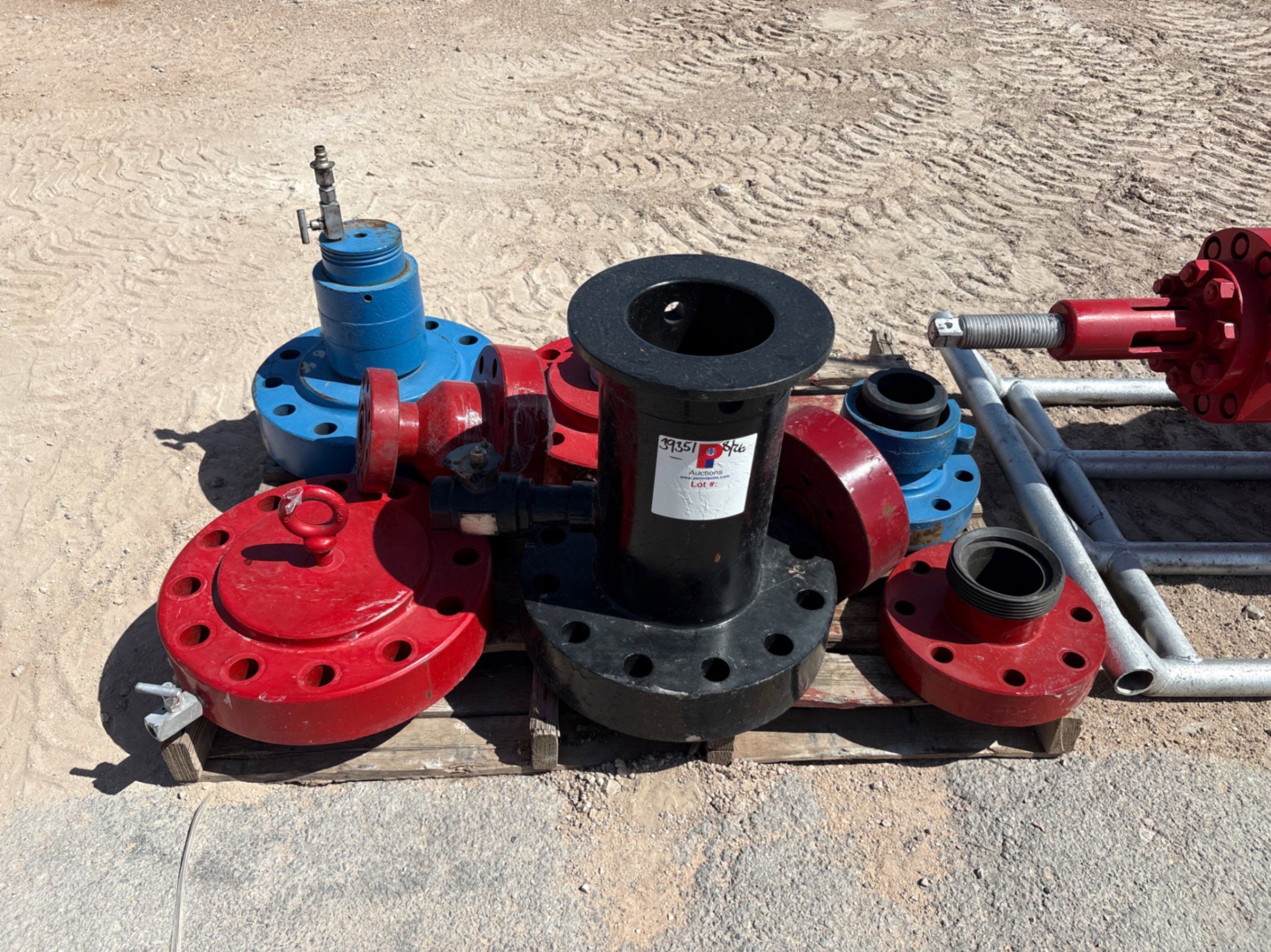 Used Pallet w/ wellhead flange,(2) 4” weco flanges, assorted test flanges