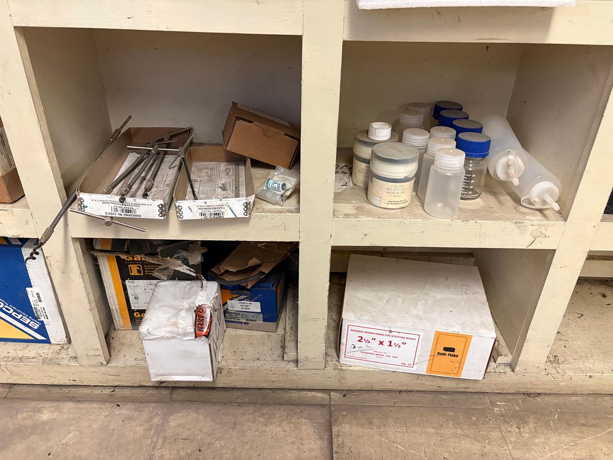 Used 18-bin shelf w/ contents