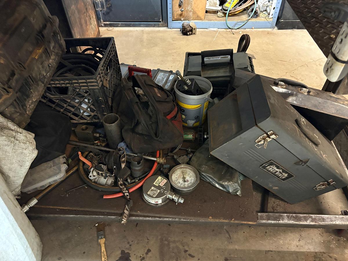 Used 64” x 40” x 41” metal shop table w/ contents