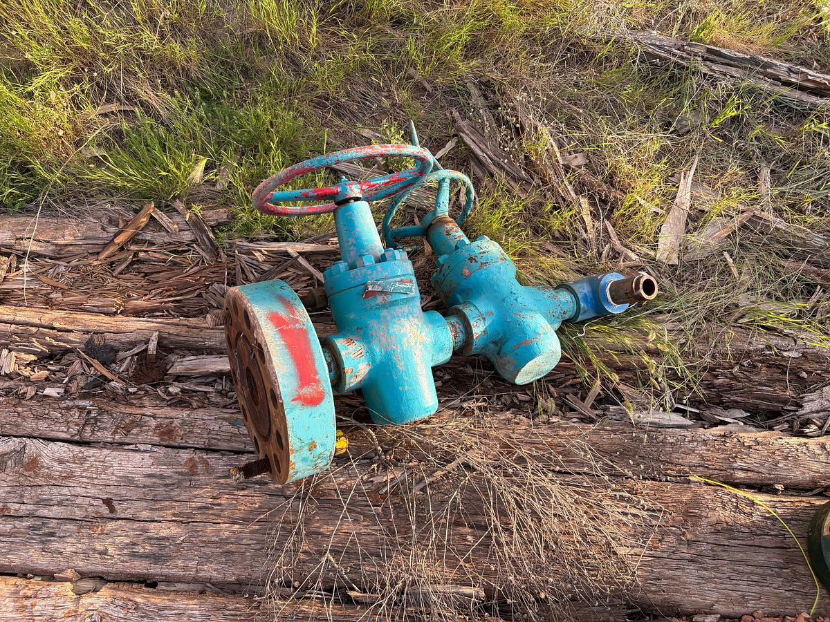 Used (2) 4-1/16” 10k hydraulic gate valves, (10) 2-9/16” gate valves, & (3) single stud adapters