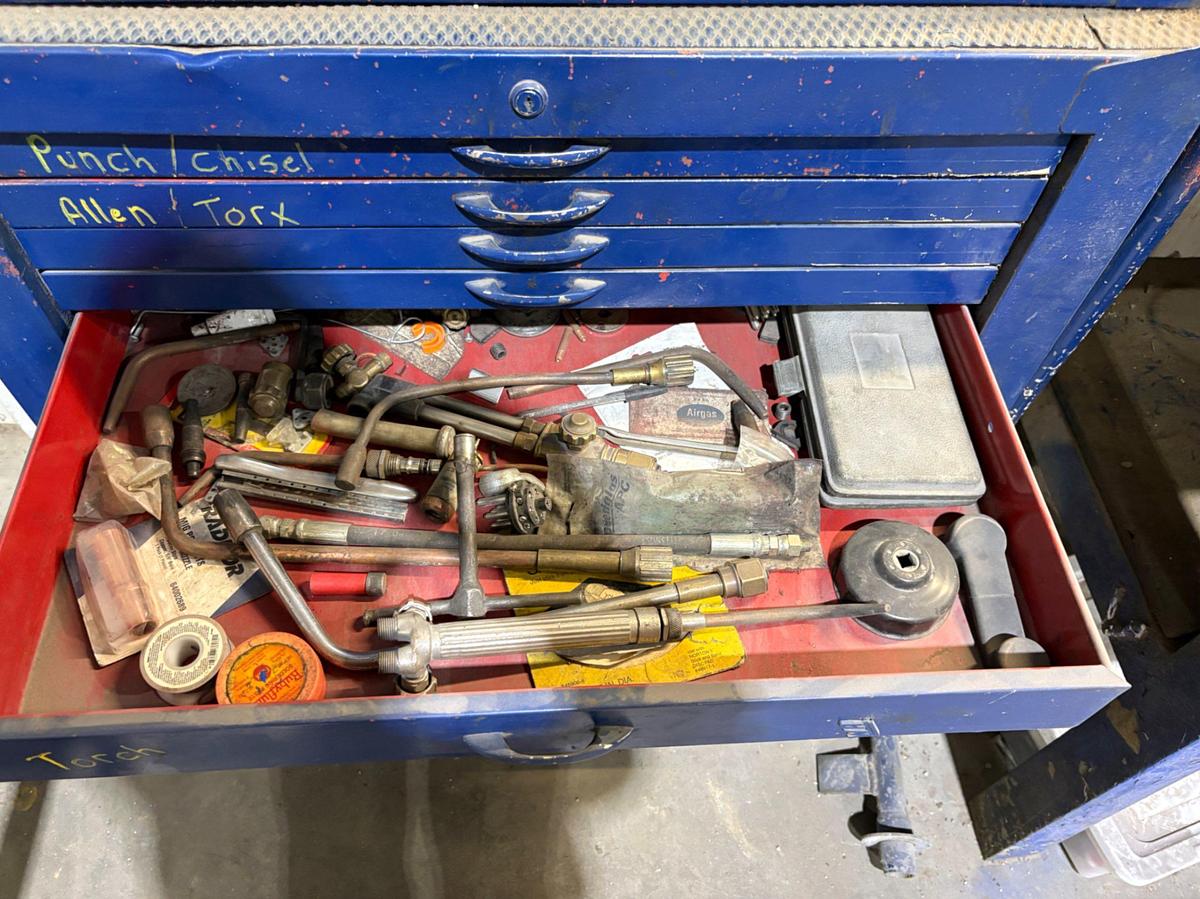 Used 34” x 18” x 60” tool box w/ contents